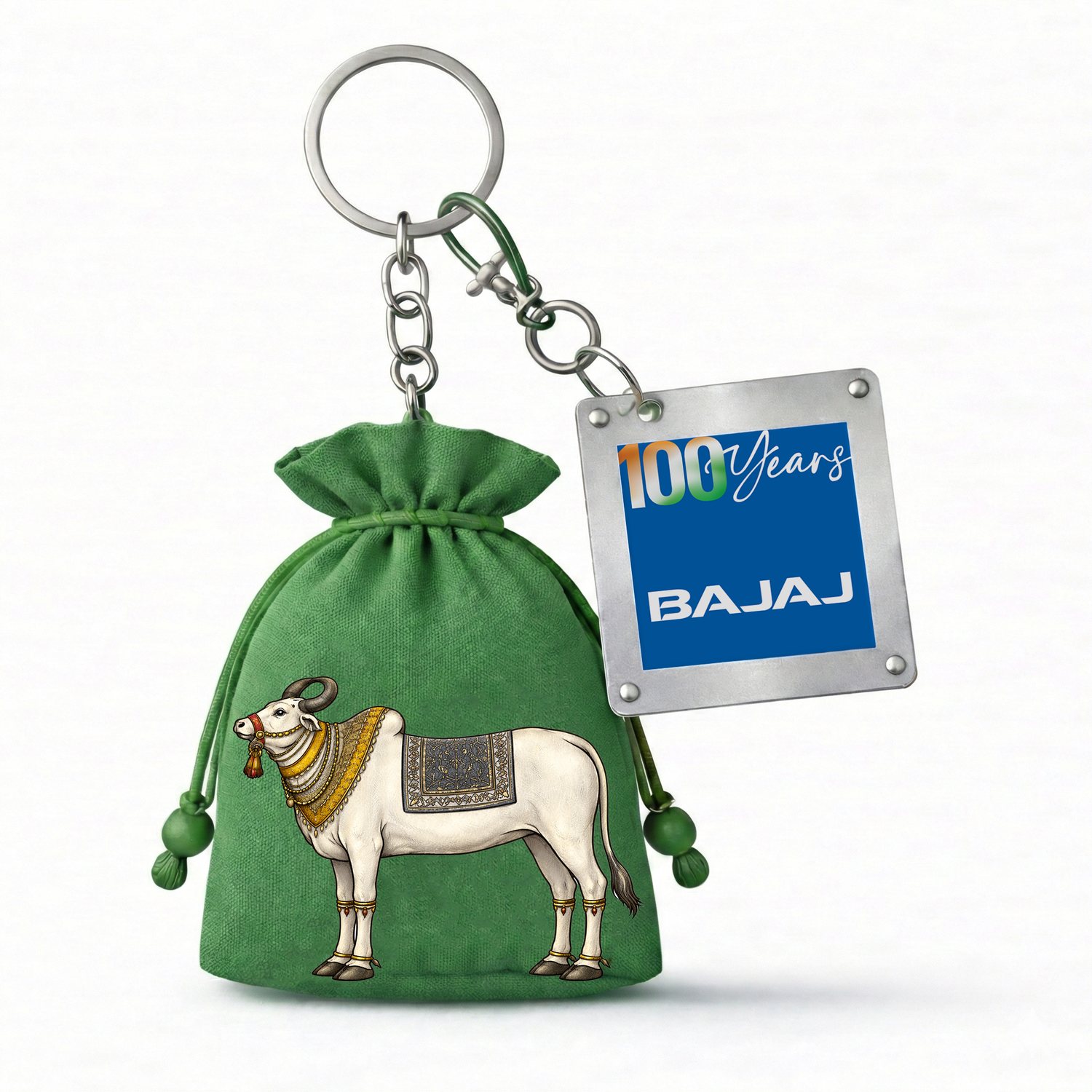 Green potli keychain with an embroidered cow and the steel Bajaj tag
