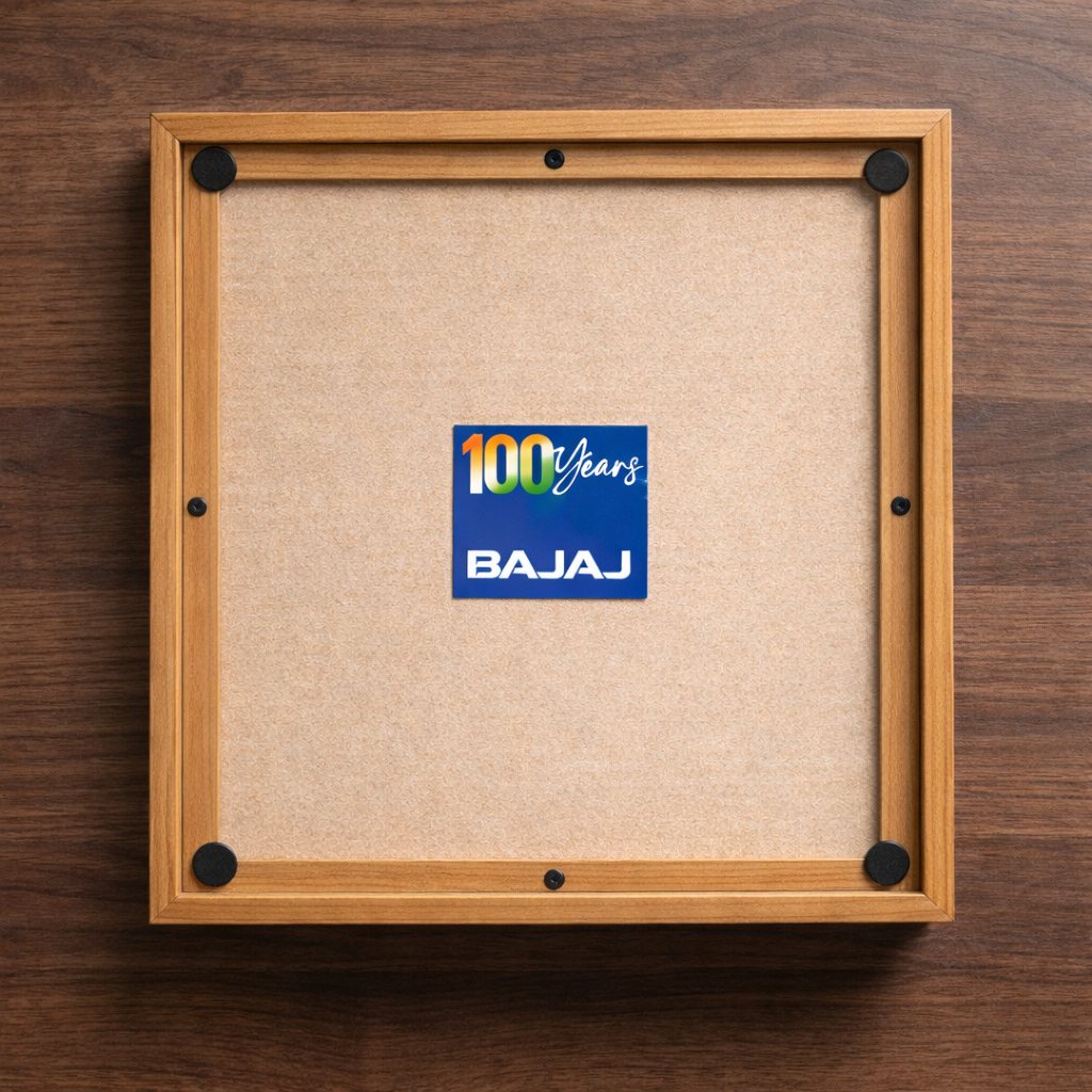 Reverse of the serving tray with the 100 Years Bajaj mark